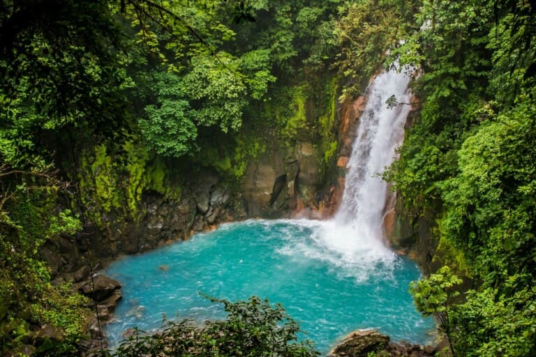 Rio Celeste waterfall in the jungle in Costa Rica